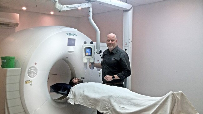 Clinic Manager at Qscan Radiology Hobart, Trent Barter prepares screening. Picture: Supplied