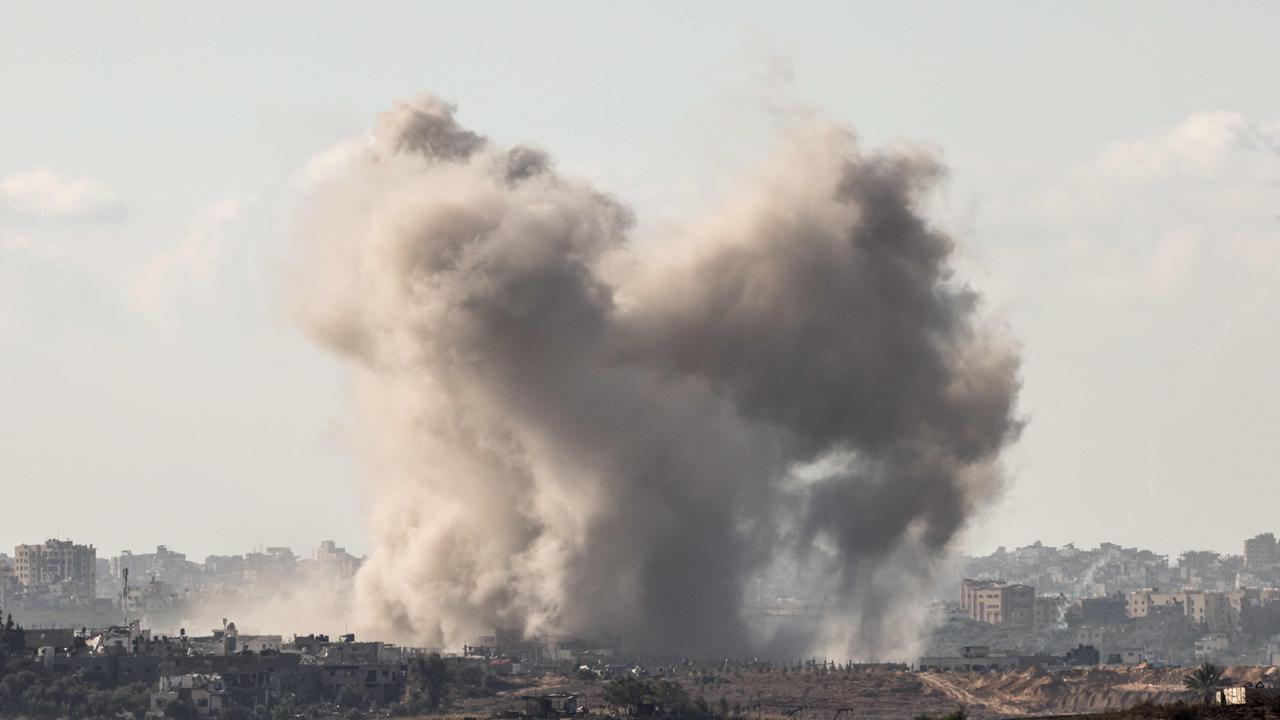 A picture taken from the border between Israel and Gaza shows smoke billowing during Israeli bombardment of the Gaza Strip. Picture: Jack Guez