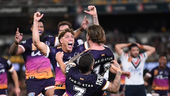 Reece Walsh celebrates Patrick Carrigan’s first try. Picture: NRL