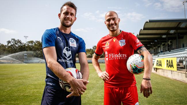 Adelaide United’s James Troisi (right) and NPL All Stars’ Alex Mullen ahead of the SA bushfires fundraising match at Marden. Picture: Matt Turner