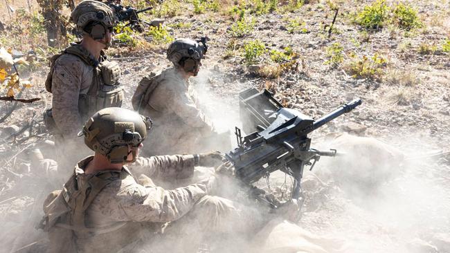 US Marines firing an automatic grenade launcher in the Mount Bundey Training Area.