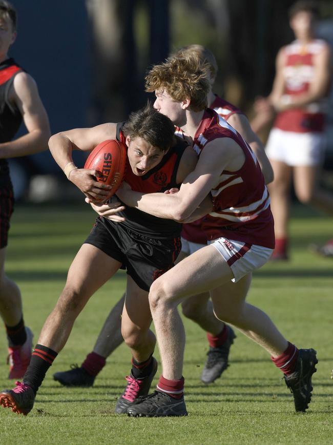 Rostrevor’s Noah Hyde in action against PAC in a college footy clash earlier this year. Hyde was one of Rostrevor’s best in the win against Immanuel at the weekend. Picture: Naomi Jellicoe