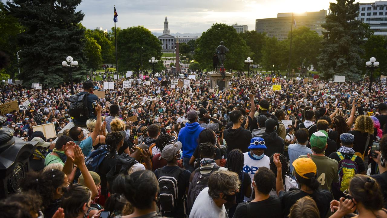 People crowd in front of the Colorado State Capitol to protest against police brutality. Picture: Michael Ciaglo/Getty Images/AFP