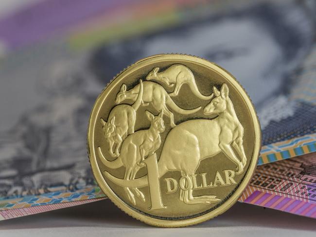 Australian $1 coin and notes close-up, investing, generic