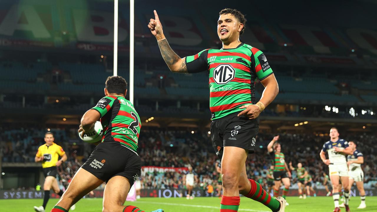 Latrell Mitchell celebrates a try by Alex Johnston against the Cowboys. Picture: Mark Metcalfe/Getty Images