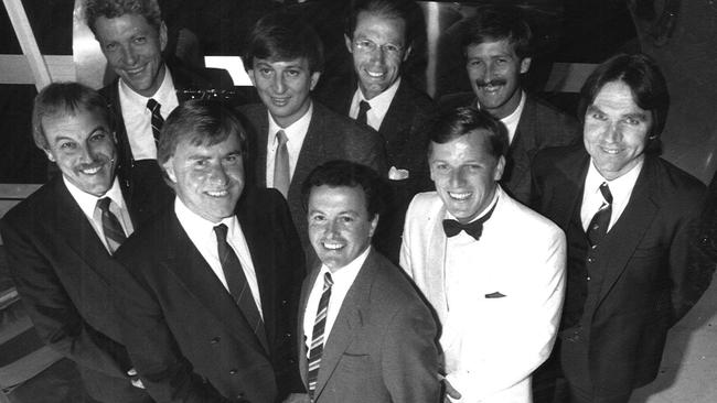 Cometti was part of the Channel Seven commentary team in 1987. Back (from left): Peter Landy, Dennis Cometti, Don Scott, Bernie Quinlan and Peter McKenna. Front (from left): Malcolm Blight, Ian Robertson Drew Morphett and Sandy Roberts.