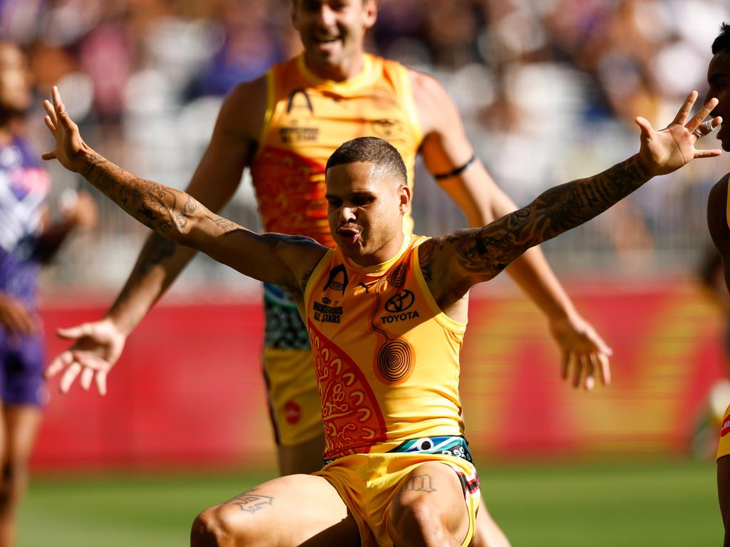 Bobby Hill lights up the Indigenous All Stars game with a traditional celebration.