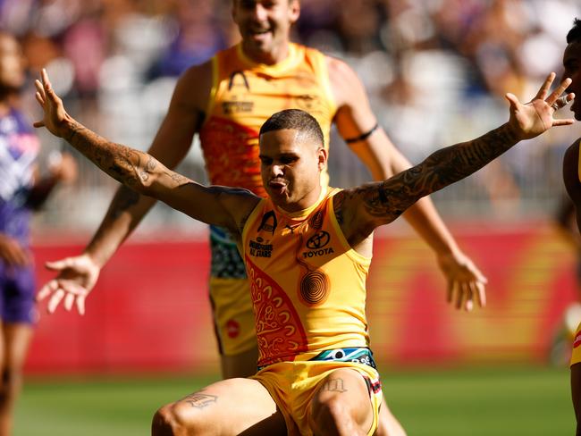 Bobby Hill lights up the Indigenous All Stars game with a traditional celebration.