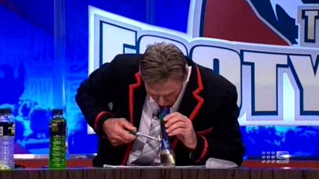 Sam Newman appears to smoke a bong on &lt;i&gt;The Footy Show&lt;/i&gt; May 3, 2012