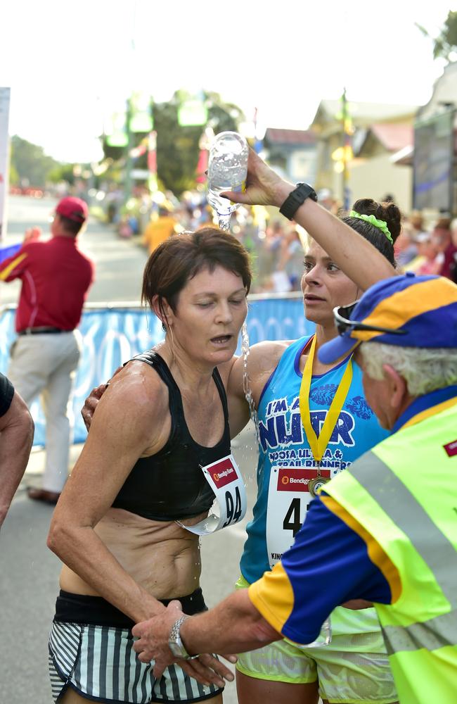 Jill Taft (left) and Meg Davidson embrace after finishing a King of the Mountain race. Picture: Che Chapman