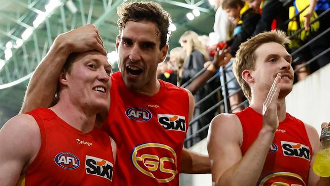 MELBOURNE, AUSTRALIA - APRIL 30: Matt Rowell, Ben King and Noah Anderson of the Suns leave the field during the 2023 AFL Round 07 match between the Richmond Tigers and the Gold Coast Suns at Marvel Stadium on April 30, 2023 in Melbourne, Australia. (Photo by Dylan Burns/AFL Photos via Getty Images)