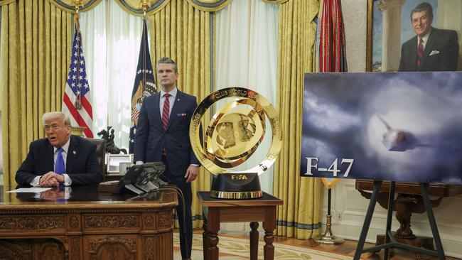 President Donald Trump, left, and Secretary of Defense Pete Hegseth with an image of an F-47 sixth-generation fighter jet in the Oval Office. Picture: AP