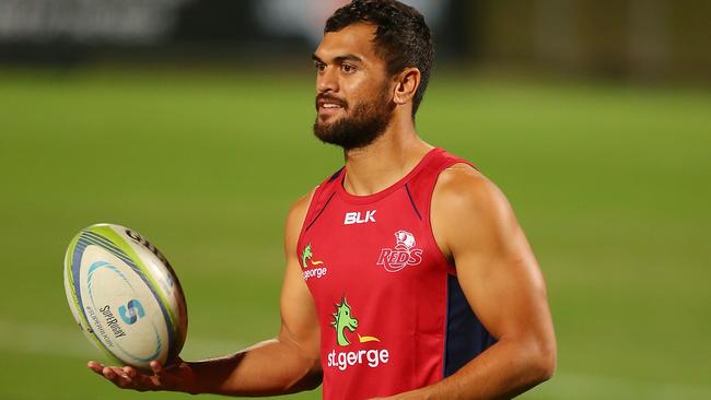 BRISBANE, AUSTRALIA - SEPTEMBER 18: (EXCLUSIVE COVERAGE) Karmichael Hunt holds the ball during a Queensland Reds training session at Ballymore Stadium on September 18, 2014 in Brisbane, Australia. (Photo by Chris Hyde/Getty Images)