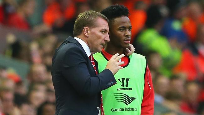 LIVERPOOL, ENGLAND - SEPTEMBER 13: Brendan Rodgers, manager of Liverpool talks to Raheem Sterling of Liverpool during the Barclays Premier League match between Liverpool and Aston Villa at Anfield on September 13, 2014 in Liverpool, England. (Photo by Alex Livesey/Getty Images)