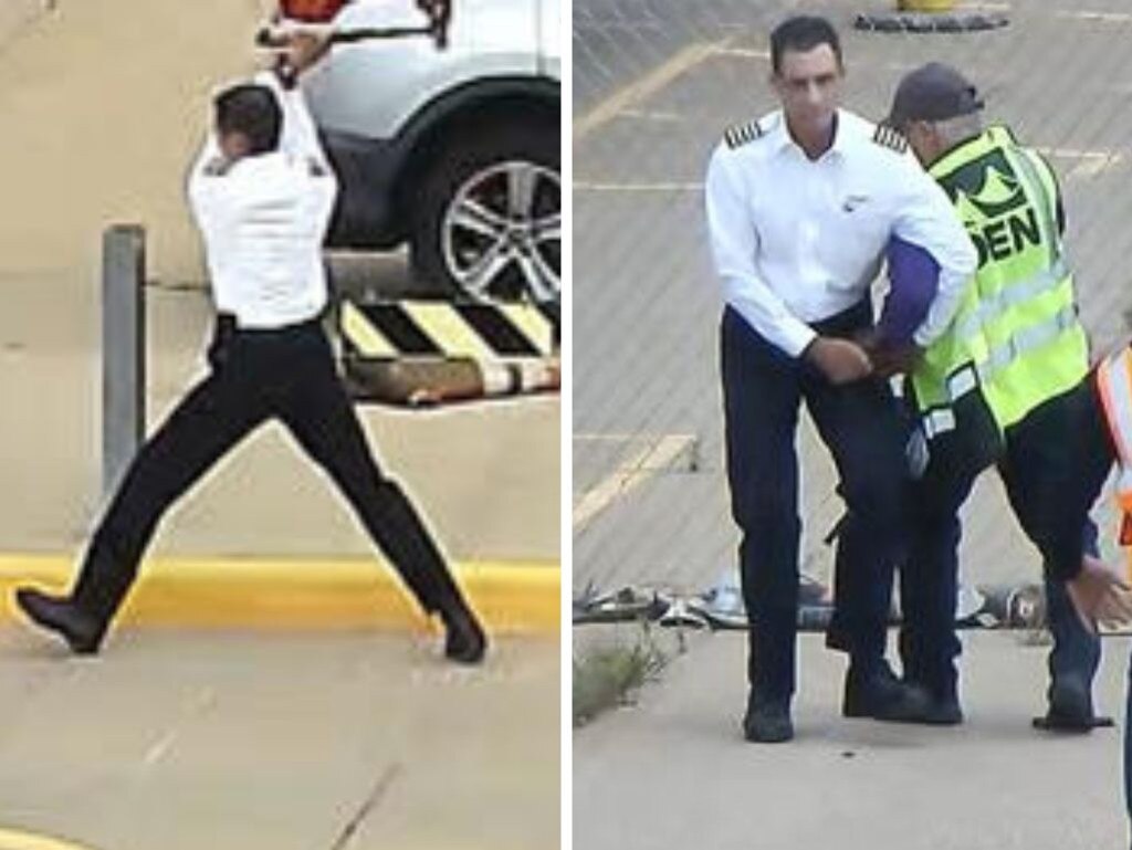 A pilot has declared he had “reached breaking point” when he attacked a parking gate with an axe in an incident captured in shocking footage. Picture: CBS News.