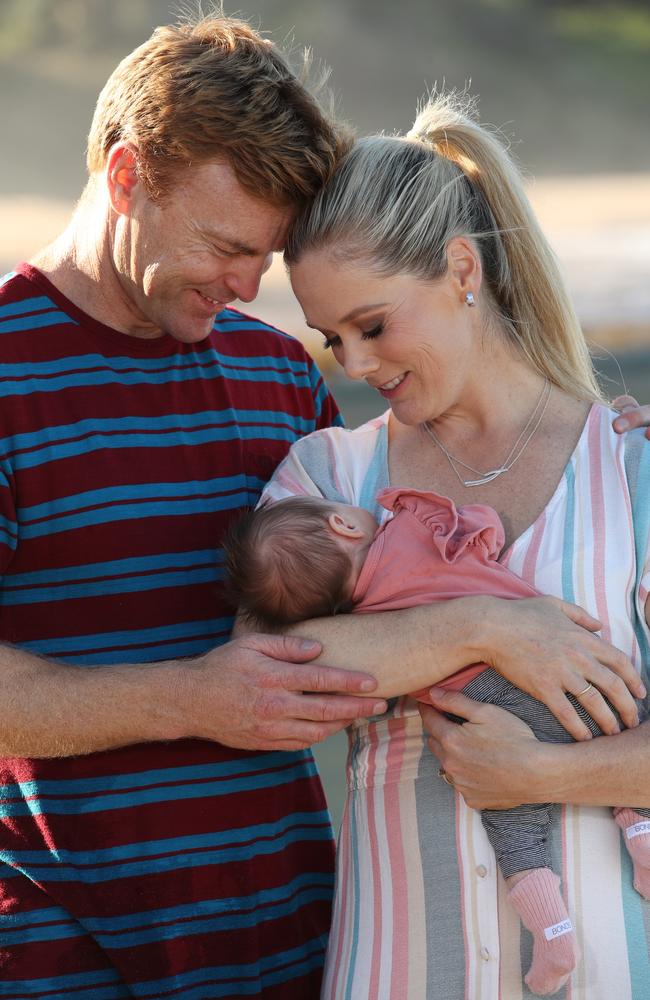 Sam and husband Ben and their daughters Elle, 6 weeks and Immi, 3. Picture: David Swift.