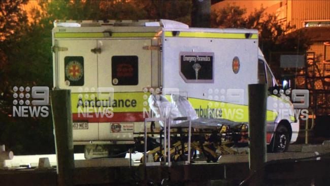 Water police transported two COVID-19 positive patients from a cargo ship to Townsville where they will be treated. Photo: 9 News North Queensland