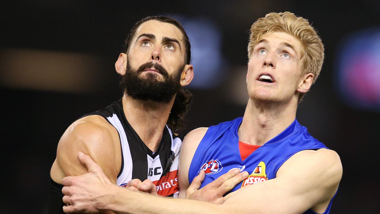 Tim English bodies with Brodie Grundy in a ruck contest last season. Picture: Michael Klein.