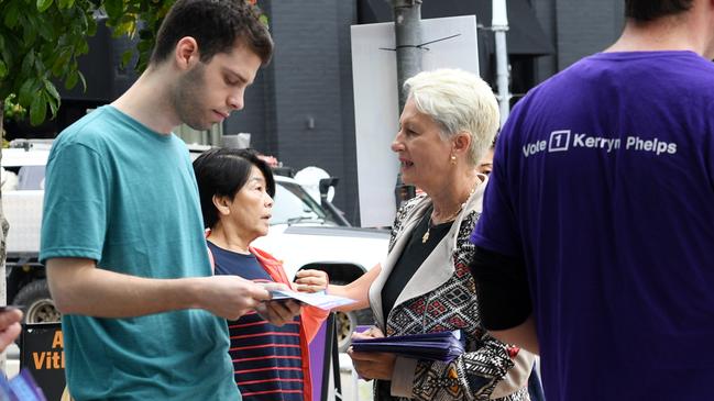 Kerryn Phelps hands out how to vote cards at a Rose Bay pre-poll in Sydney. Picture: Tracey Nearmy.