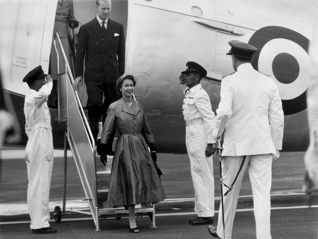 Queen Elizabeth II with Prince Philip stepping from a plane during the royal visit to South Australia in 1954.