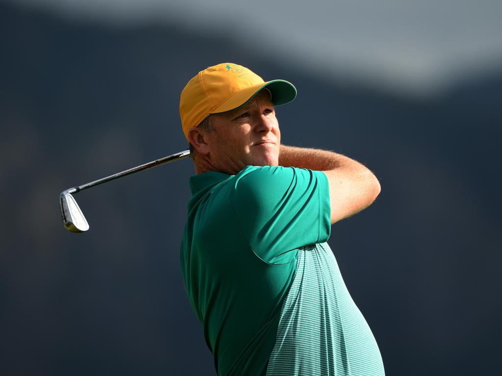 Marcus Fraser plays a shot from the fourth tee during the first round of men’s golf. He is leading at the end of play.