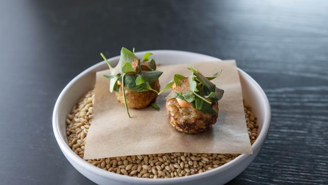 Scarlet prawn doughnuts. Picture: Mark Cranitch.