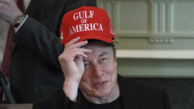At the top of the tottering totem of Trump’s tech tycoons is the almost-trillionaire Tesla mechanic Elon Musk. Picture: AP
