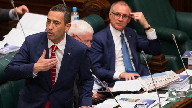 Treasurer Tom Koutsantonis delivering his State Budget address in Parliament House with Premier Jay Weatherill looking on. Picture: AAP Image/Ben Macmahon