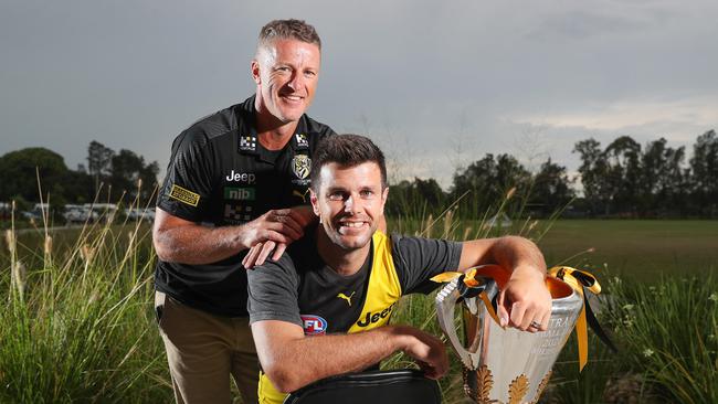 Richmond coach Damien Hardwick with his captain Trent Cotchin and their cup.AFL - Sunday, 25th October, 2020 - Richmond players the afternoon after the historic Grand Final Win - at their Hub location in the Gold Coast. Picture: Sarah Reed