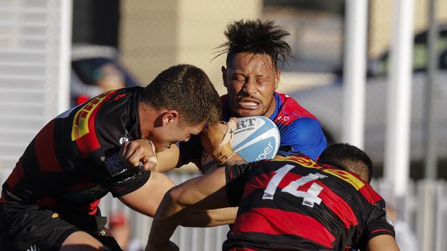 Action during the Manly v Northern Suburbs game of the day in Shute Shield. Pic: Karen Watson.