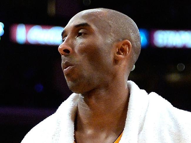 LOS ANGELES, CA - JANUARY 15: Kobe Bryant #24 of the Los Angeles Lakers ices he knees during a 109-102 loss to the Cleveland Cavaliers at Staples Center on January 15, 2015 in Los Angeles, California. NOTE TO USER: User expressly acknowledges and agrees that, by downloading and or using this Photograph, user is consenting to the terms and condition of the Getty Images License Agreement. Harry How/Getty Images/AFP == FOR NEWSPAPERS, INTERNET, TELCOS & TELEVISION USE ONLY ==