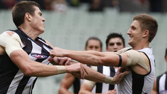 Mason Cox gets into Port Adelaide's Hamish Hartlett after his goal in the first quarter. Picture: George Salpigtidis