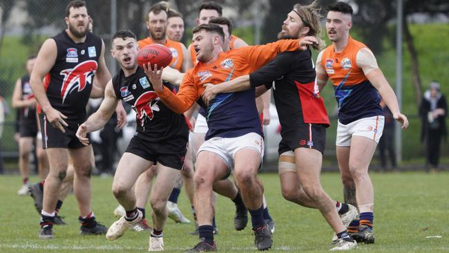 SFL: Lyndhurst’s Charlie Gardiner under pressure. Picture: Valeriu Campan