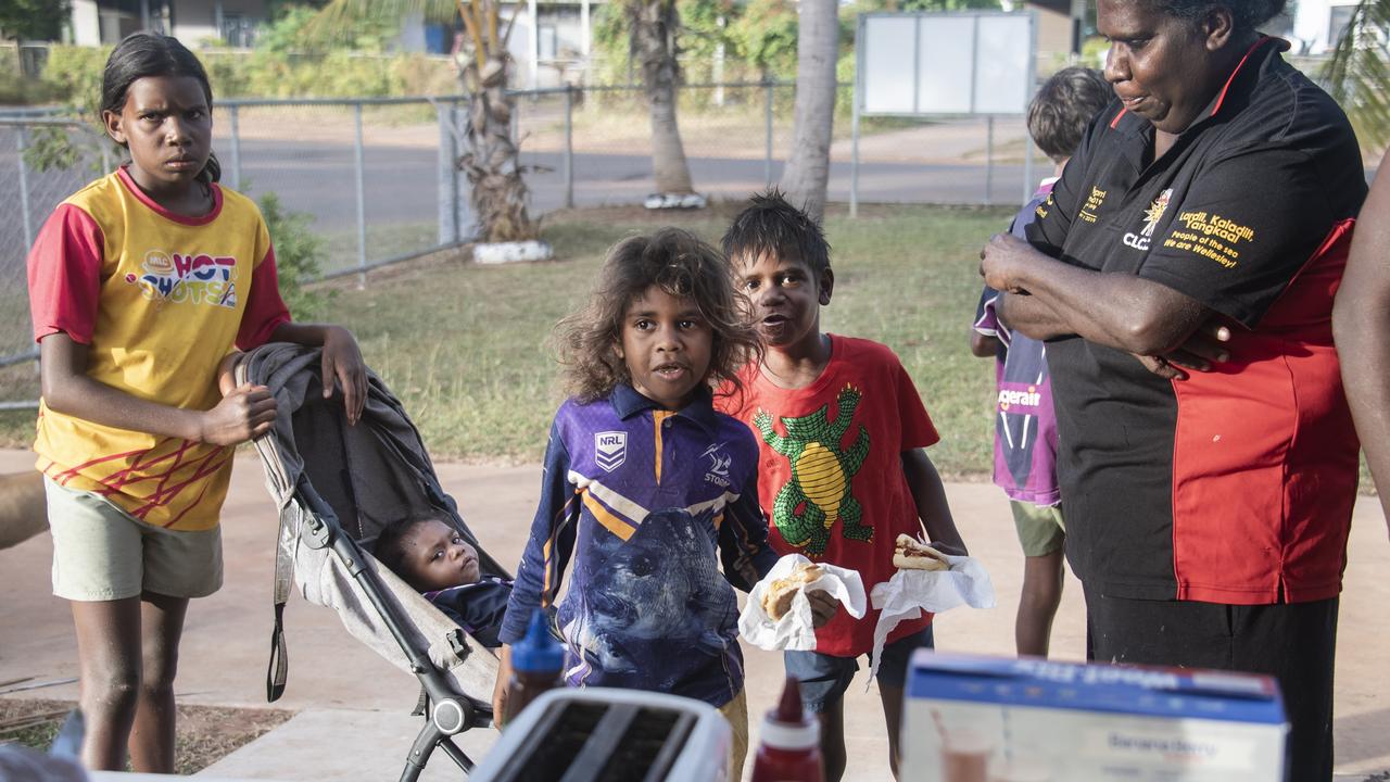 Mornington Island children arrive for a free cooked breakfast supplied by the Gangurrumungalen - Gully Peters - Memorial Church. Photo: Brian Cassey