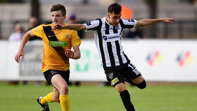 Adelaide City’s Stefan Casalbore in action earlier this year, scored during the Black and Whites’ 2-2 draw with Adelaide United youth on Saturday. Picture: AAP/Mark Brake