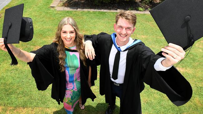 Pharmacy graduate Eren White and Medicine graduate Patrick de Waele at the James Cook University graduation at Townsville Entertainment Centre. Picture: Shae Beplate.