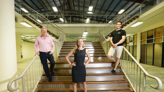 Opmantek’s Danny Maher, The Gold Coast Hub CEO Sharon Hunneybell and Little Tokyo Two founder Mike Danelli at the old Billabong Wave factory, where the hub will take shape. Picture Glenn Hampson