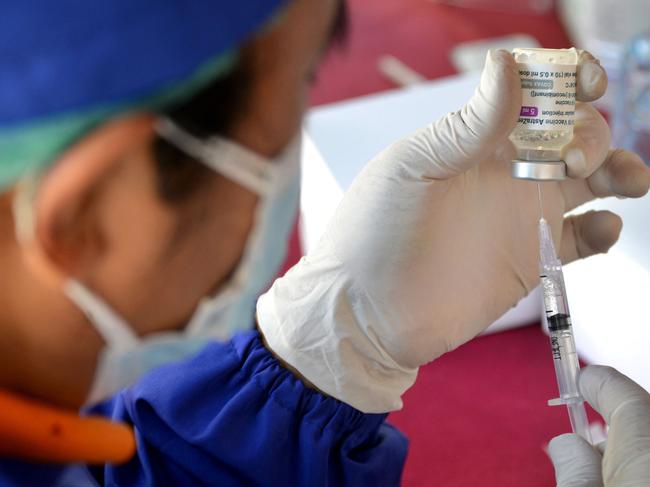 A health worker prepares a dose of the AstraZeneca Covid-19 coronavirus vaccine.