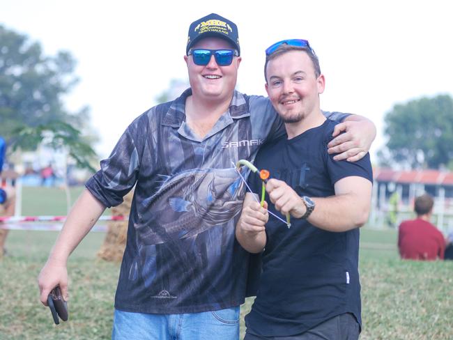 Luke Sikyr and Mac Hornby enjoying day two of the Royal Darwin Show. Picture: Glenn Campbell