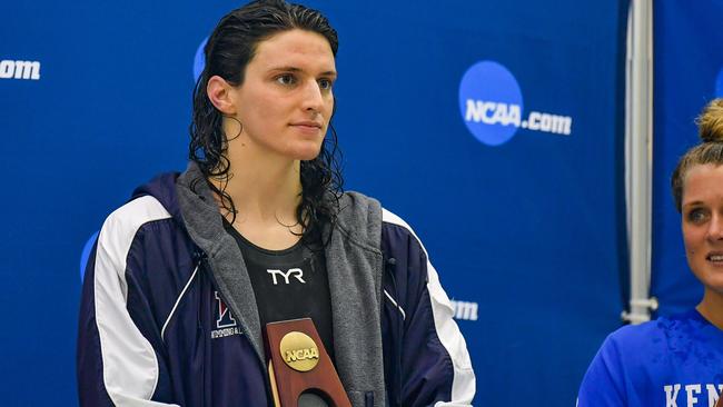 Lia Thomas on top of the podium. Photo by Rich von Biberstein/Icon Sportswire via Getty Images.