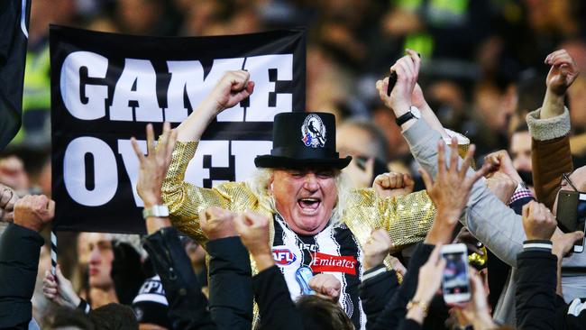 Joffa Corfe celebrates a Magpies goal during an AFL preliminary final in 2018.