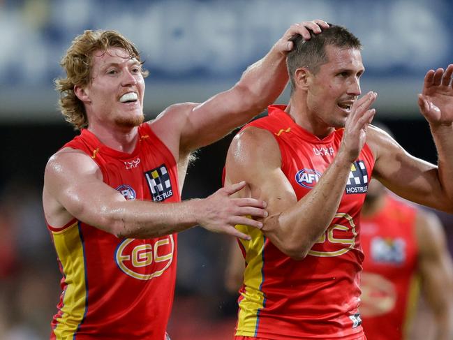 GOLD COAST, AUSTRALIA - APRIL 13: David Swallow of the Suns celebrates a goal during the 2024 AFL Round 05 match between the Gold Coast SUNS and the Hawthorn Hawks at People First Stadium on April 13, 2024 in Gold Coast, Australia. (Photo by Russell Freeman/AFL Photos via Getty Images)