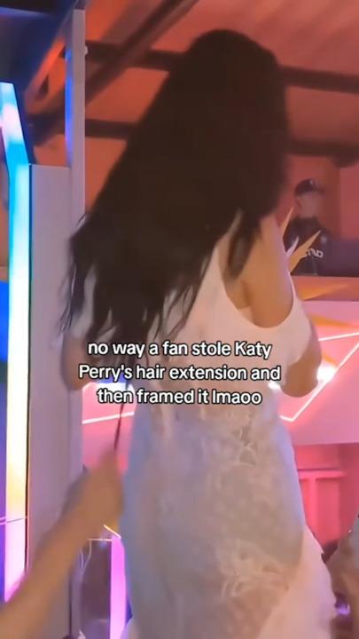 Wild moment a fan pulled out Katy Perry's hair extension in the middle of a nightclub