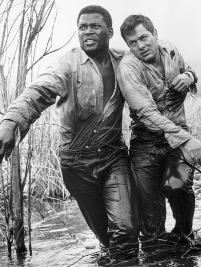 Sidney Poitier and Tony Curtis in 1958 film The Defiant Ones.