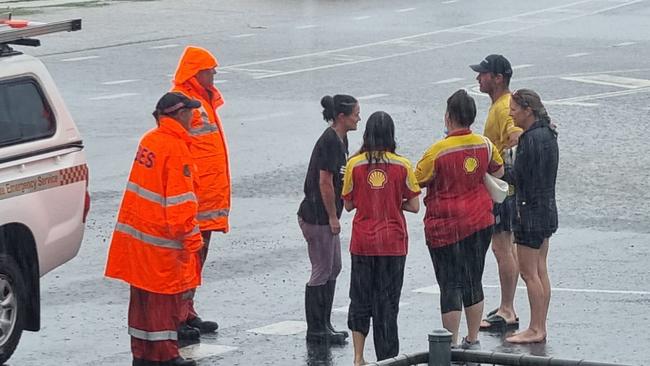 The Goomeri Shell Garage team had to be rescued through flood waters. Photo: Facebook