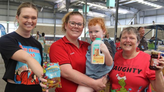 Mayor's Christmas Charity volunteers Kate Brunger, Anna Spear, Nova Spear and Katrina Trevithick at the Fred Moule Pavilion on Tuesday morning.