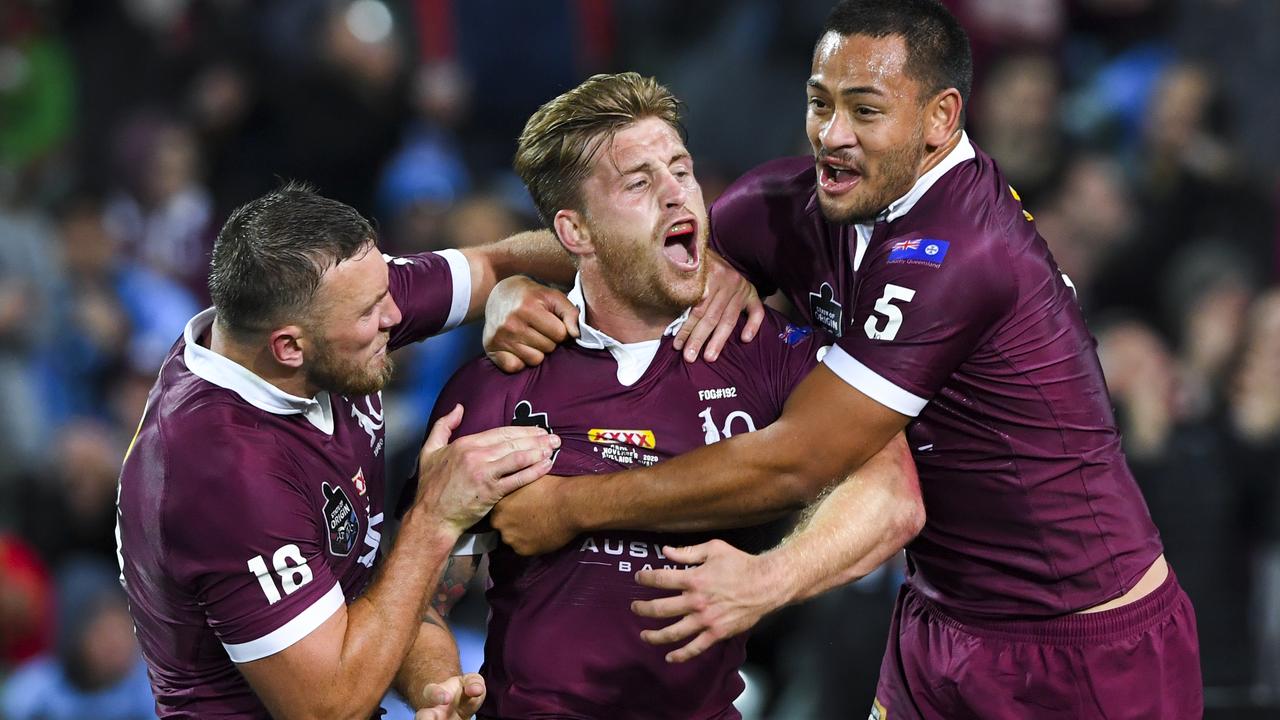Cameron Munster celebrates after scoring a try during Game 1 of the 2020 State of Origin series