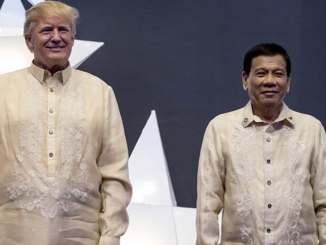 President Donald Trump and Philippines President Rodrigo Duterte at an ASEAN Summit dinner in Manila, Philippines. Picture: AP