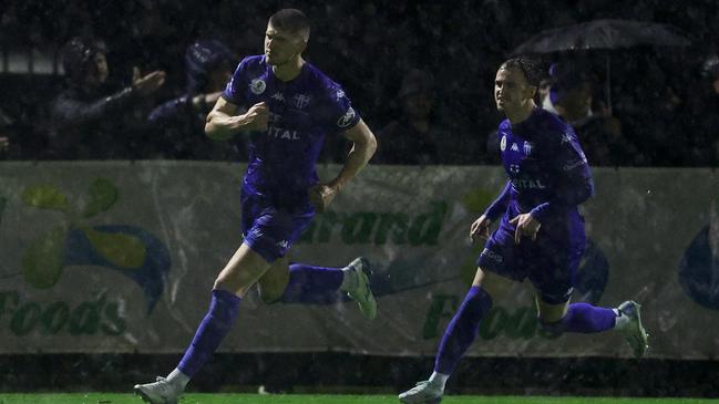 Harrison Sawyer celebrates a goal for South Melbourne.