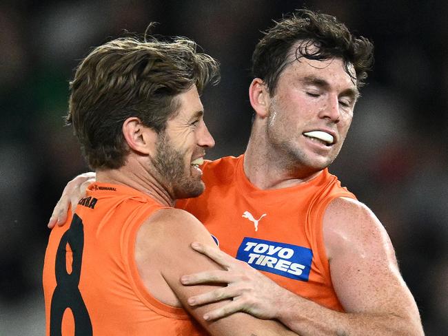 Ward takes a closer look at Daniels’ hair during a game. Picture: Quinn Rooney/Getty Images